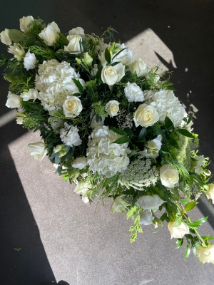 White casket spray