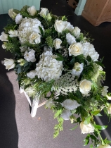 White casket spray